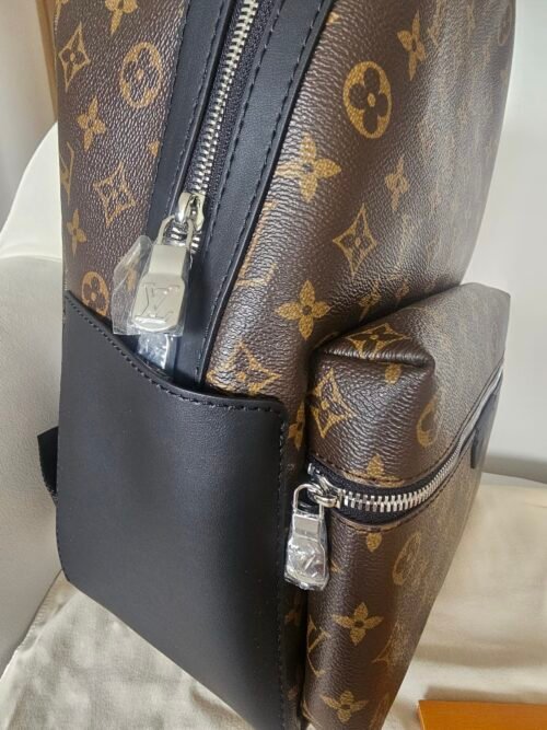 Louis Vuitton — Morral de monograma marrón con bolsillo frontal