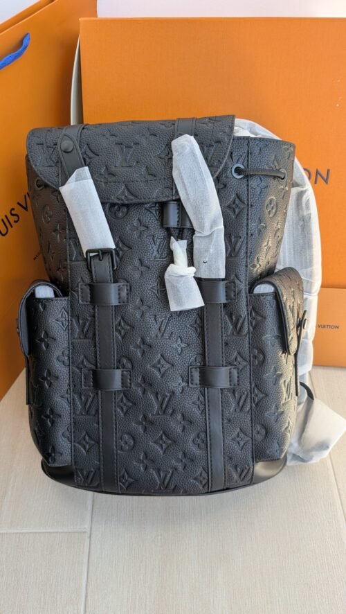 Louis Vuitton — Morral gris de monograma en relieve