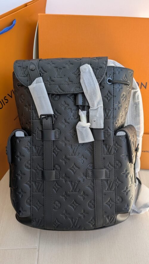 Louis Vuitton — Morral gris de monograma en relieve