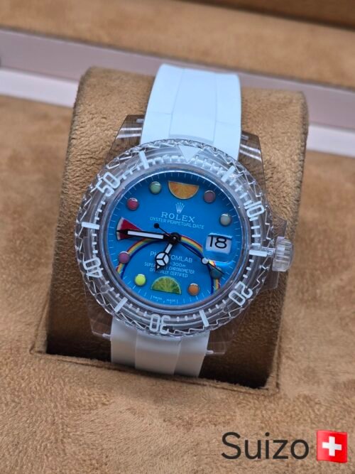 Rolex — esfera azul multicolor y correa blanca