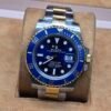 Rolex — esfera azul y brazalete bicolor
