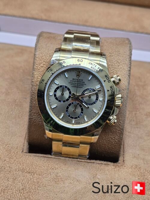 Rolex — esfera gris y brazalete dorado