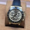 Rolex — esfera dorada y correa negra