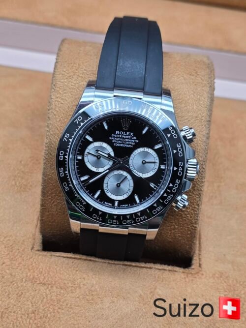 Rolex — esfera negra con subesferas plateadas · correa negra