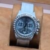 Rolex — esfera celeste y correa blanca