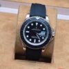 Rolex — esfera negra · caja rosada y correa negra