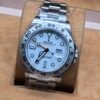 Rolex — esfera blanca y bisel de 24 horas