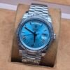 Rolex — esfera celeste con indicador de día