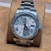 Rolex — esfera blanca y números romanos