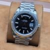 Rolex — esfera negra con indicador de día