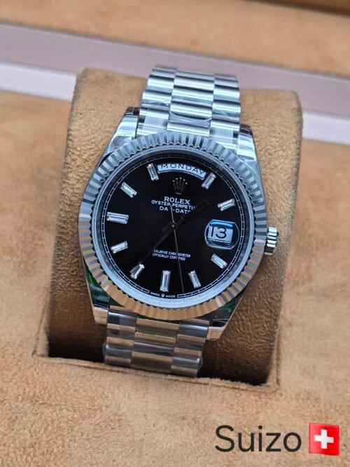 Rolex — esfera negra con indicador de día