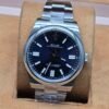 Rolex — esfera azul oscuro y brazalete plateado