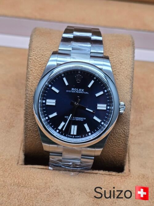 Rolex — esfera azul oscuro y brazalete plateado