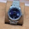 Rolex — esfera azul con números romanos · 36 mm