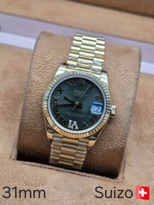 Rolex — esfera gris y brazalete dorado · 31 mm