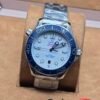 Omega — esfera blanca y bisel azul