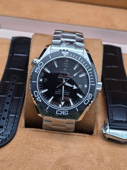 Omega — esfera negra y bisel gris