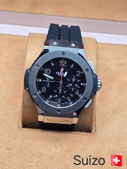 Hublot — esfera negra · bisel gris y correa texturizada