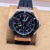 Hublot — esfera negra · bisel negro y caja rosada