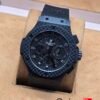 Hublot — esfera negra y caja con patrón de cuadros