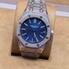 Audemars Piguet — esfera azul y brazalete brillante rosado