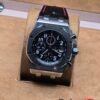 Audemars Piguet — esfera negra con subesferas y costuras rojas
