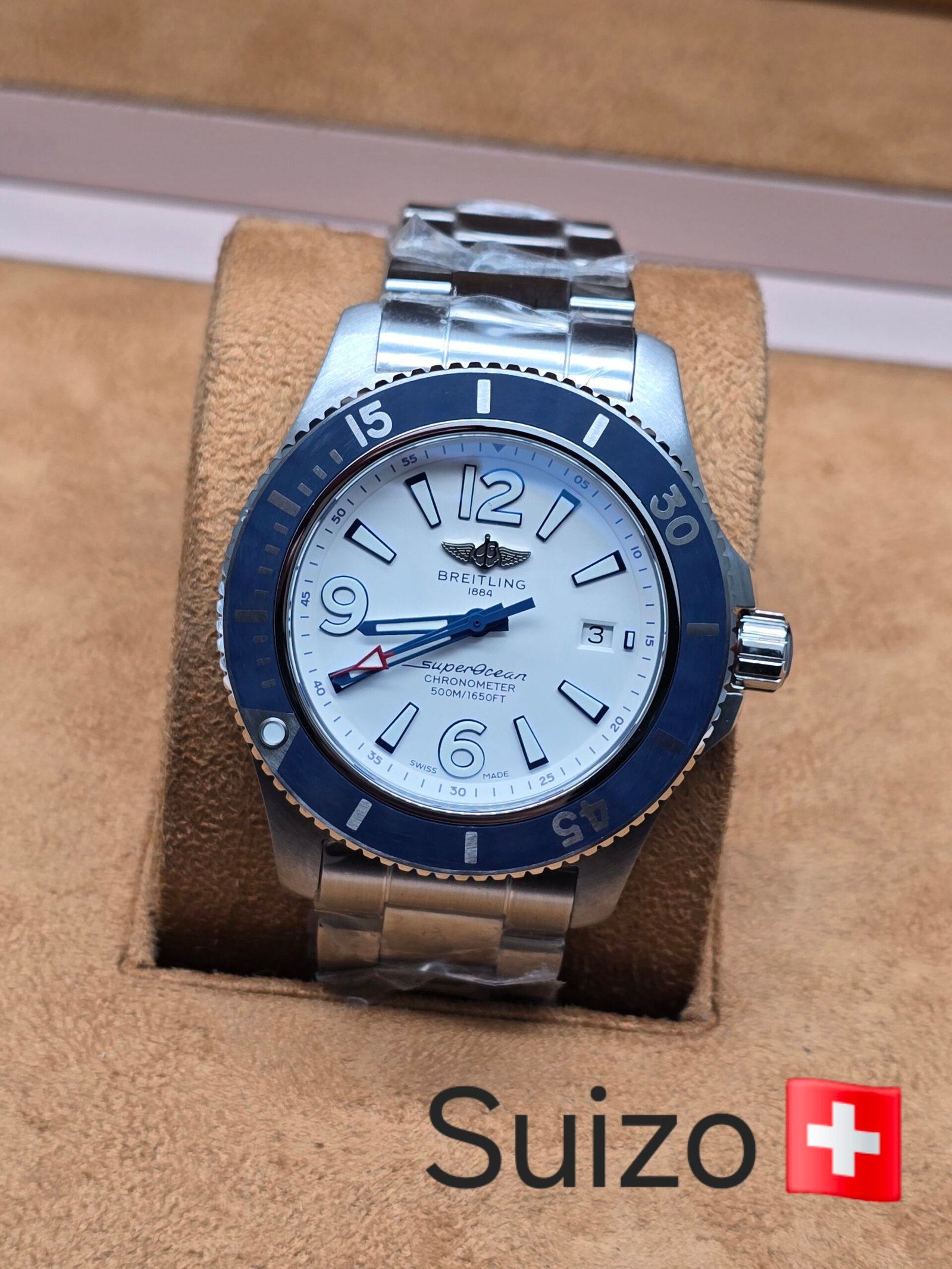 Breitling — esfera blanca y bisel azul