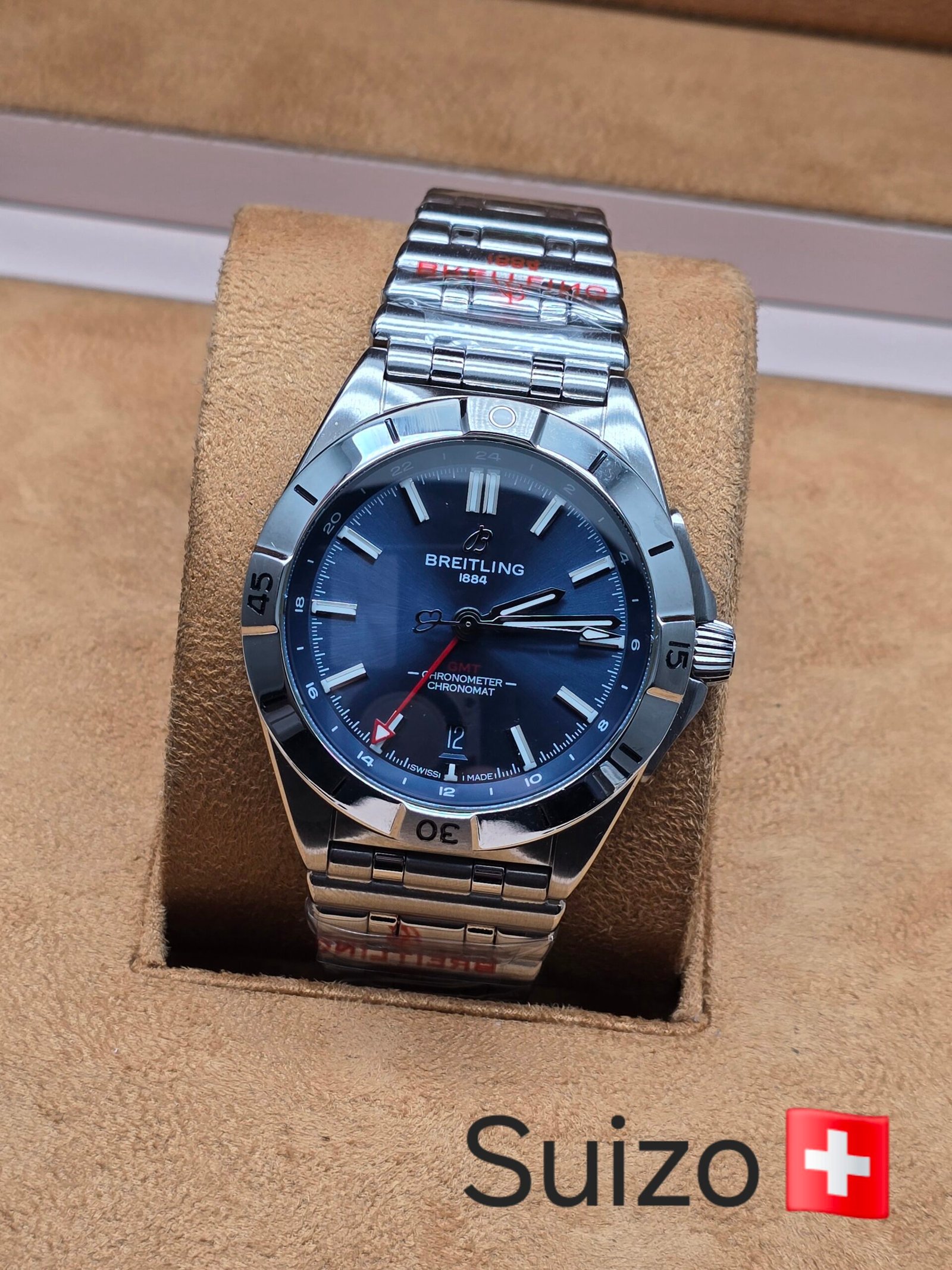 Breitling — esfera azul y bisel plateado