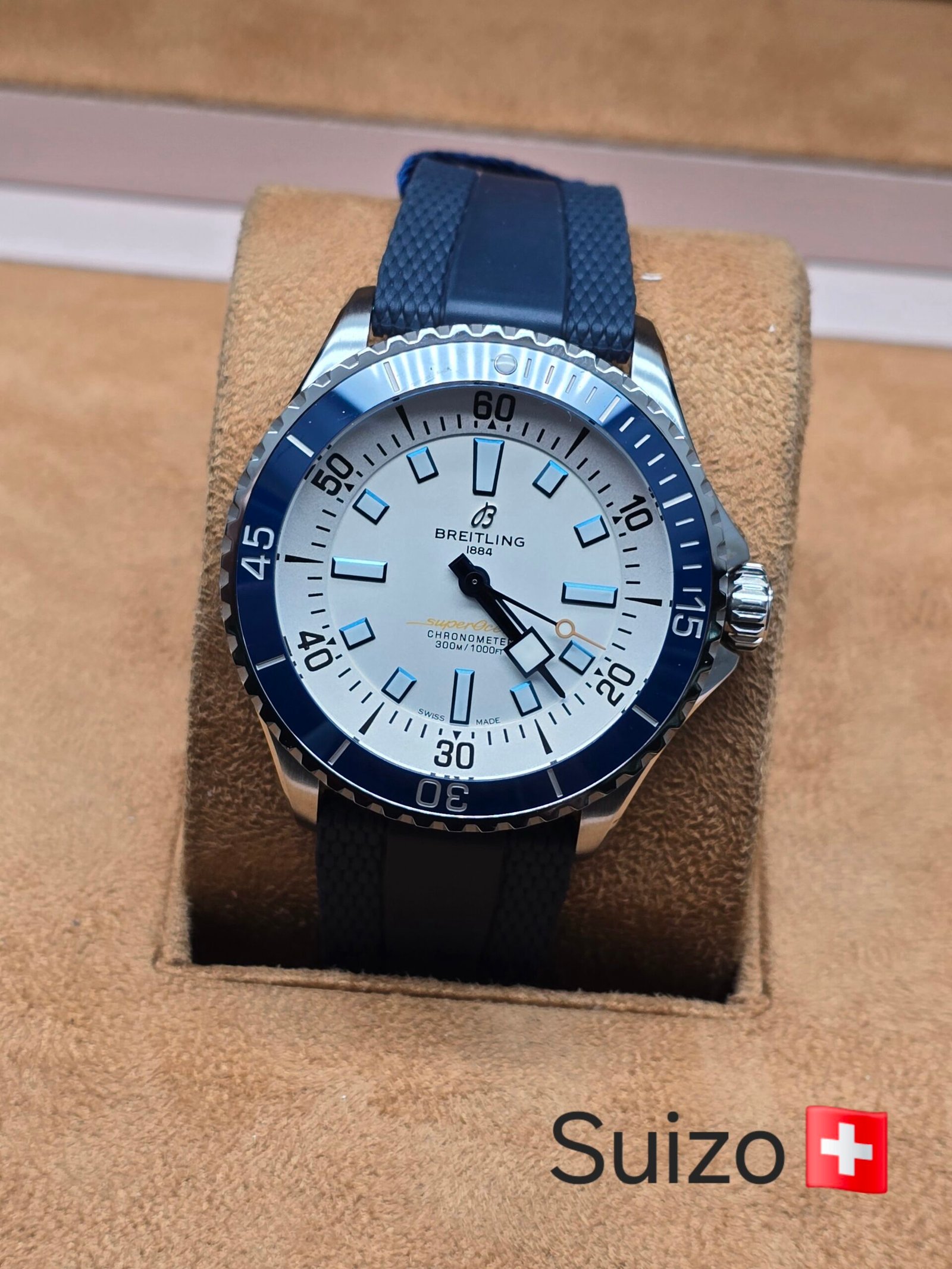 Breitling — esfera blanca y correa azul