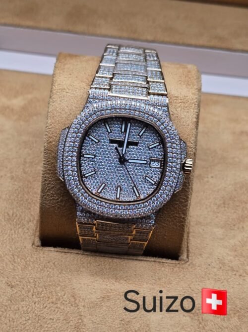 Patek Philippe — esfera y brazalete con detalles brillantes