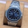 Patek Philippe — esfera azul oscuro y brazalete plateado