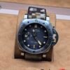 Panerai — esfera negra y correa con patrón marrón