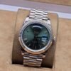 Rolex — esfera verde y brazalete tono rosado