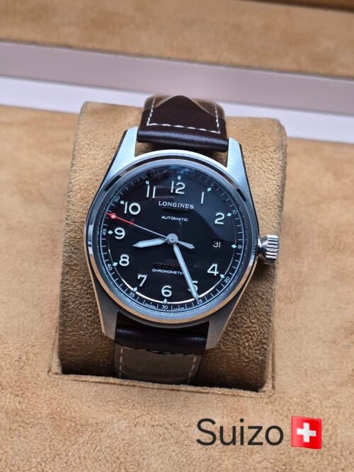 Longines — esfera negra y correa marrón