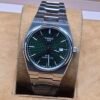 Tissot — esfera verde texturizada y brazalete plateado