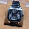 Cartier — esfera negra y caja cuadrada plateada