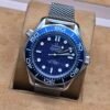 Omega — esfera azul y brazalete de malla