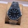 Audemars Piguet — esfera negra texturizada y brazalete plateado