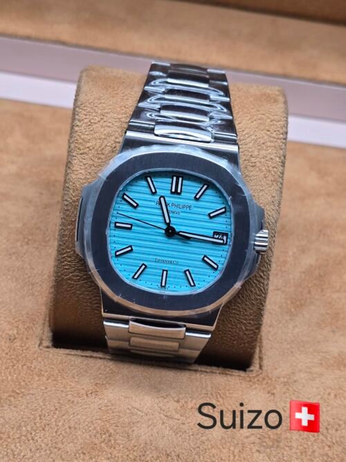 Patek Philippe — esfera turquesa y brazalete plateado