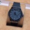 Hublot — esfera gris texturizada y correa negra