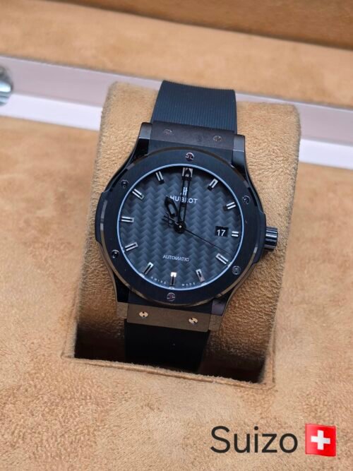 Hublot — esfera gris texturizada y correa negra
