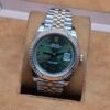 Rolex — esfera verde y brazalete bicolor