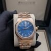 Audemars Piguet — esfera azul texturizada, caja y brazalete oro rosa