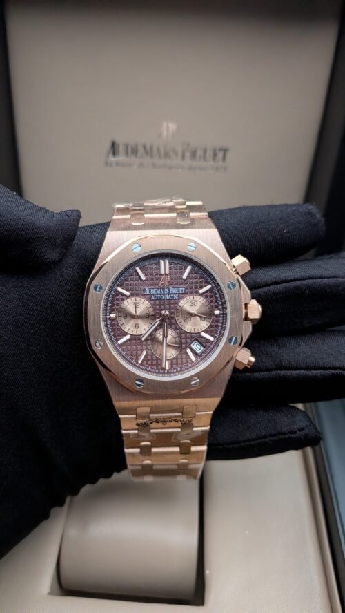 Audemars Piguet — cronógrafo con esfera marrón texturizada, caja y brazalete oro rosa