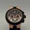 Bvlgari — cronógrafo con esfera negra y detalle esqueleto, caja oro rosa y correa de caucho negra
