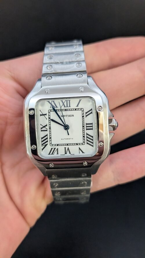 Cartier — caja cuadrada de acero con tornillos, esfera blanca con números romanos y brazalete de acero