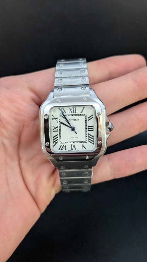 Cartier — caja cuadrada de acero con tornillos, esfera blanca con números romanos y brazalete de acero