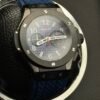Hublot — cronógrafo con esfera azul, caja negra y correa de caucho azul