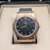 Hublot — esfera negra, caja oro rosa y correa de caucho negra