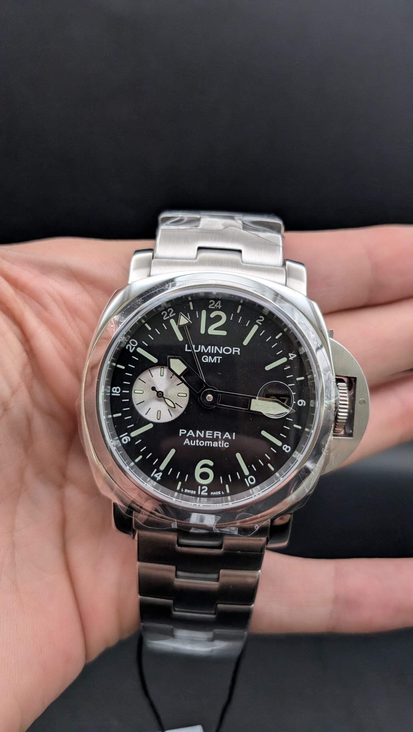 Panerai — esfera negra con doble huso horario y brazalete de acero